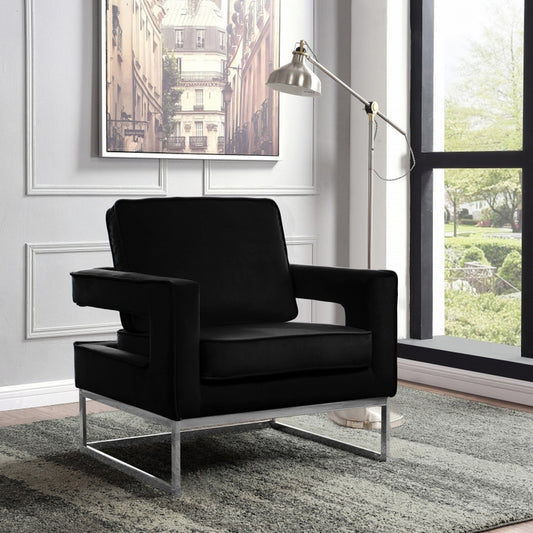 Black Velvet Accent Chair With Stainless Steel Base in Chrome finish.